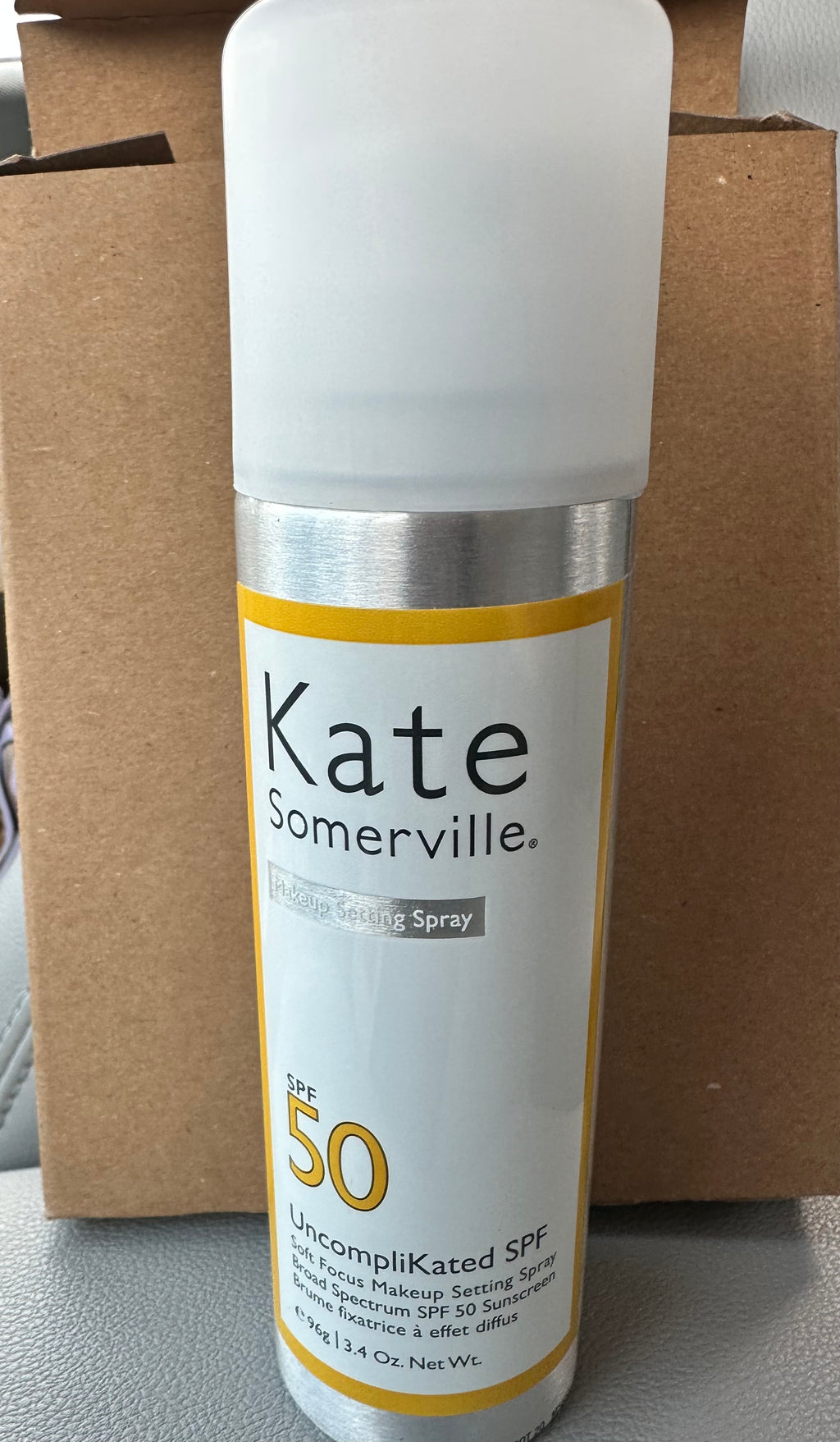 Makeup setting spray with SPF 50, Kate Somerville brand.
